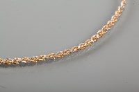 Lot 1785 - EIGHTEEN CARAT GOLD BI-COLOUR CHAIN NECKLACE...
