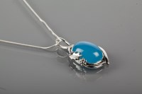 Lot 1792 - CHALCEDONY PENDANT ON CHAIN the oval cabochon...