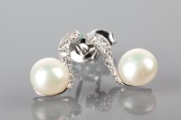 Lot 1793 - PAIR OF PEARL SET STUD EARRINGS each set with...