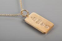 Lot 1805 - NINE CARAT GOLD INGOT PENDANT ON CHAIN 18.5g...