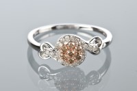 Lot 1813 - DIAMOND DRESS RING set with white and brown...