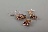 Lot 1817 - THREE PAIRS OF NINE CARAT GOLD GARNET SET...