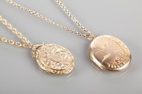Lot 1822 - TWO ENGRAVED LOCKETS one in nine carat gold,...