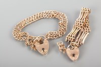 Lot 1840 - TWO ROW CURB LINK BRACELET the heart shaped...
