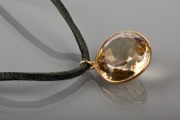 Lot 1842 - LARGE CITRINE PENDANT formed by a single round...