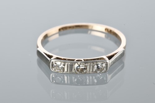 Lot 1903 - DIAMOND THREE STONE RING set with three...