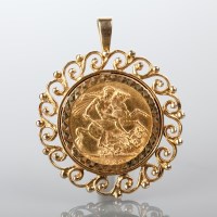 Lot 1534 - SOVEREIGN DATED 1928 in a nine carat gold mount