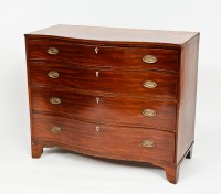 Lot 716 - GEORGE III SERPENTINE MAHOGANY CHEST the four...