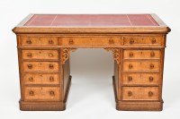 Lot 722 - LATE VICTORIAN OAK PEDESTAL DESK with red...