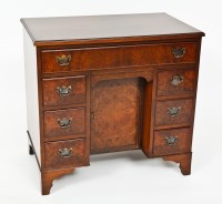 Lot 728 - GEORGE III STYLE WALNUT KNEEHOLE DESK with one...