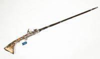 Lot 272 - MIDDLE EASTERN RIFLE with white metal mounts...