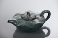 Lot 364 - CHINESE YI XING TEAPOT AND COVER in green...