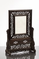 Lot 382 - CHINESE JADE AND WOOD TABLE SCREEN the central...