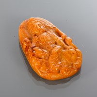 Lot 396 - CHINESE JADE AMULET with deity, 7cm high