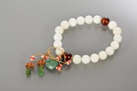 Lot 433 - 19TH/20TH CENTURY CHINESE CELADON JADE BEADS...