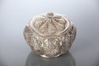 Lot 264 - INDIAN WHITE METAL TEA CADDY with lobed body...