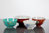 Lot 311 - FOUR CHINESE BOWLS comprising a blue and white...