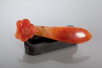 Lot 348 - CHINESE RED JADE BELT BUCKLE circa early 19th...