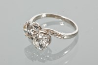Lot 1626 - EDWARDIAN DIAMOND TWO STONE RING with two...