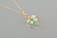 Lot 1636 - CHINESE GOLD JADE SET PENDANT set with five...