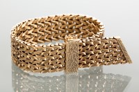Lot 1646 - NINE CARAT GOLD WOVEN BRACELET 18mm wide,...