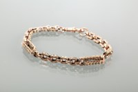 Lot 1657 - VICTORIAN NINE CARAT GOLD BRACELET formed from...