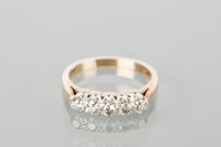 Lot 1666 - DIAMOND FIVE STONE RING set with brilliant cut...