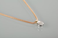 Lot 1668 - DIAMOND SOLITAIRE PENDANT set with a brilliant...