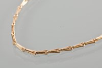 Lot 1676 - NINE CARAT GOLD CHAIN NECKLACE with tapered...