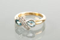 Lot 1694 - EIGHTEEN CARAT GOLD AQUAMARINE AND DIAMOND...