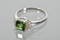 Lot 1701 - TOURMALINE AND DIAMOND RING with a central...