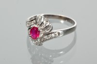 Lot 1705 - RUBY AND DIAMOND RING the twist bezel set with...