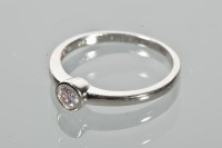 Lot 1718 - DIAMOND SOLITAIRE RING the brilliant cut stone...