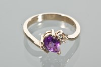 Lot 1728 - AMETHYST AND DIAMOND RING set with a single...