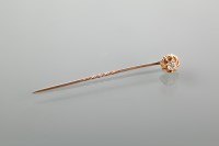 Lot 1761 - DIAMOND STICK PIN set with an old cut diamond...
