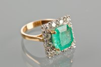 Lot 1769 - IMPRESSIVE EMERALD AND DIAMOND CLUSTER RING...
