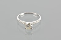 Lot 1780 - DIAMOND SOLITAIRE RING the brilliant cut...