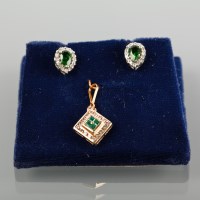 Lot 1785 - EMERALD AND DIAMOND PENDANT of rhombic form,...
