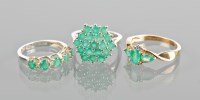 Lot 1786 - THREE EMERALD RINGS one with three emeralds...