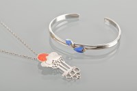 Lot 1792 - ENAMEL AND DIAMOND SET SILVER BANGLE AND A...