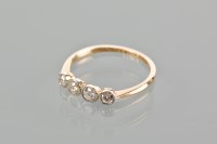 Lot 1802 - EDWARDIAN DIAMOND FOUR STONE RING set with old...
