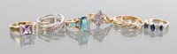 Lot 1808 - GROUP OF EIGHT NINE CARAT GOLD GEM SET RINGS...