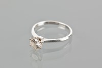 Lot 1815 - DIAMOND SOLITAIRE RING the brilliant cut...