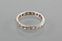 Lot 1822 - DIAMOND FULL ETERNITY RING set with brilliant...