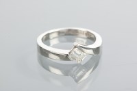 Lot 1840 - DIAMOND SOLITAIRE RING the emerald cut diamond...