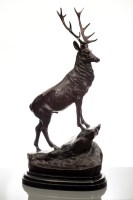 Lot 724 - PAIR OF BRONZE STAGS after the original by J...