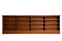 Lot 763 - EDWARDIAN MAHOGANY OPEN BOOKCASE on a plinth...