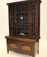 Lot 811 - ARTS & CRAFTS MAHOGANY AND STAINED GLASS...