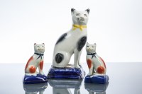 Lot 491 - 19TH CENTURY STAFFORDSHIRE FIGURE OF A SITTING...