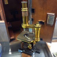 Lot 724 - CASED BRASS MONOCULAR MICROSCOPE BY CARL ZEISS,...